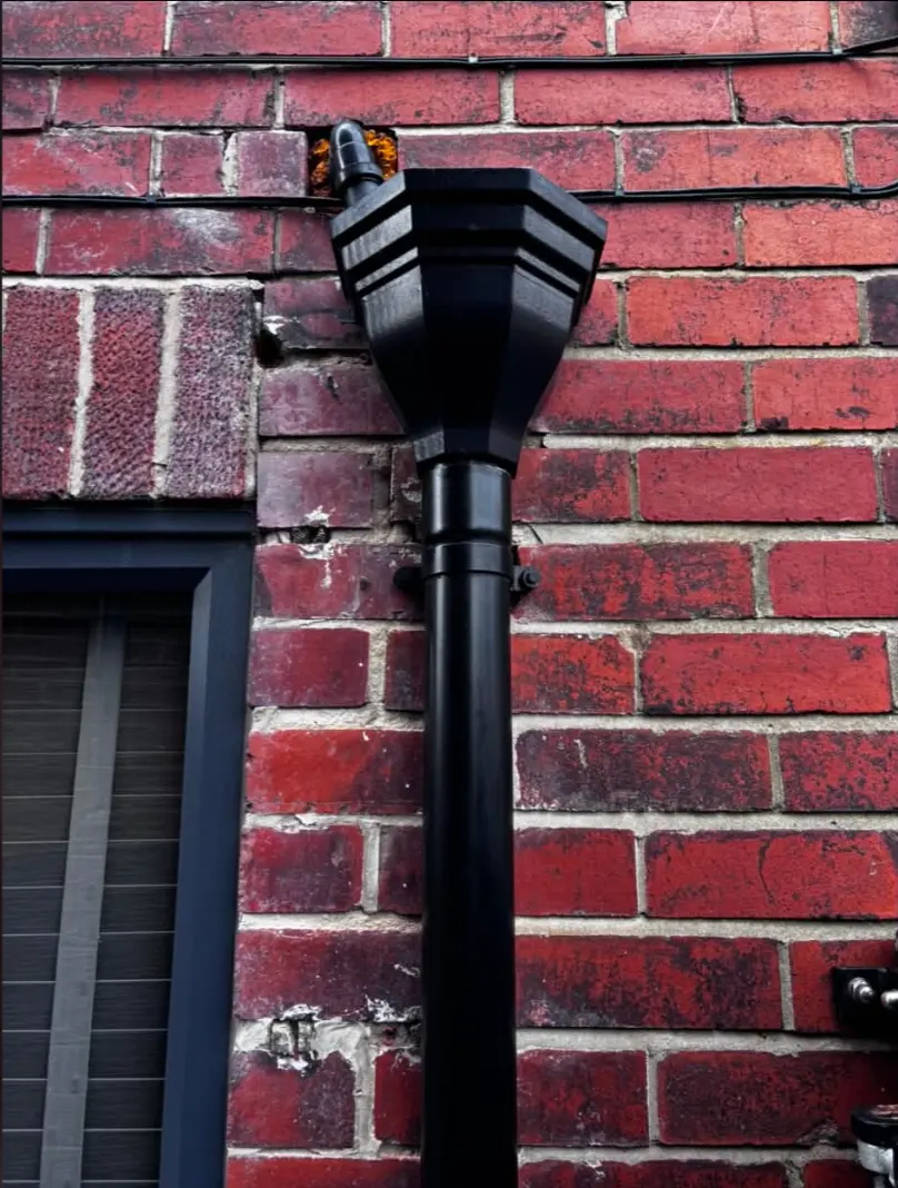 Professional downpipe installation on a Yorkshire property