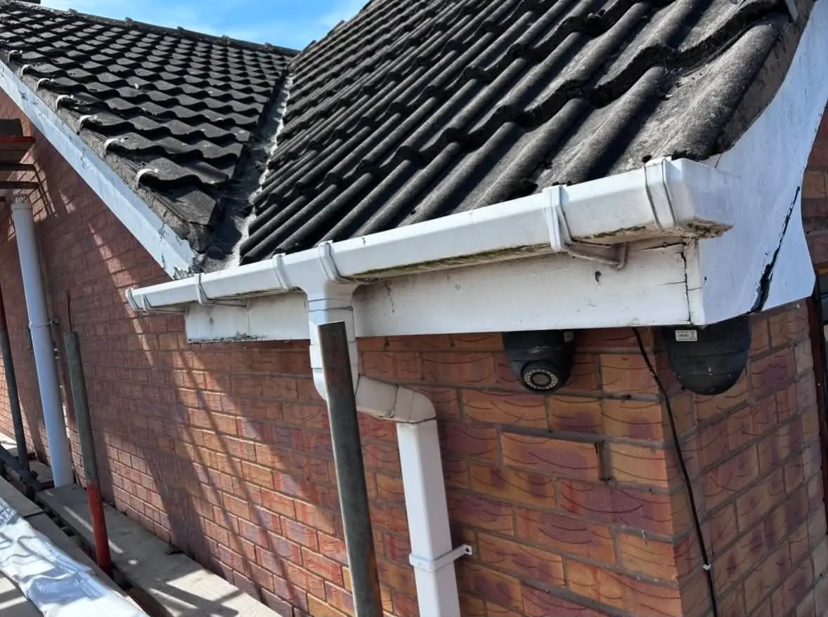 Property before gutter fascia and downpipe replacement