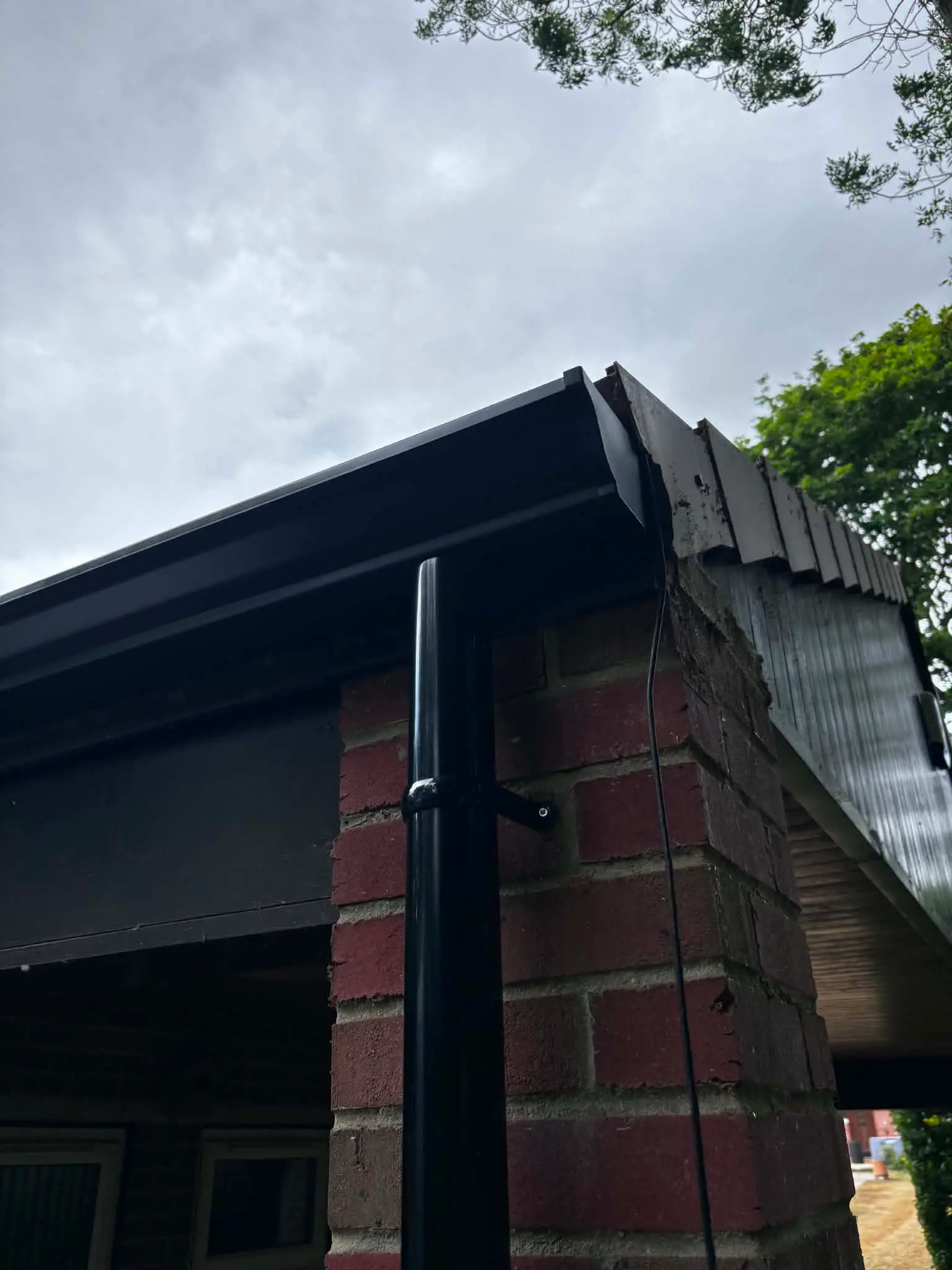 Close-up of seamless aluminium guttering installation