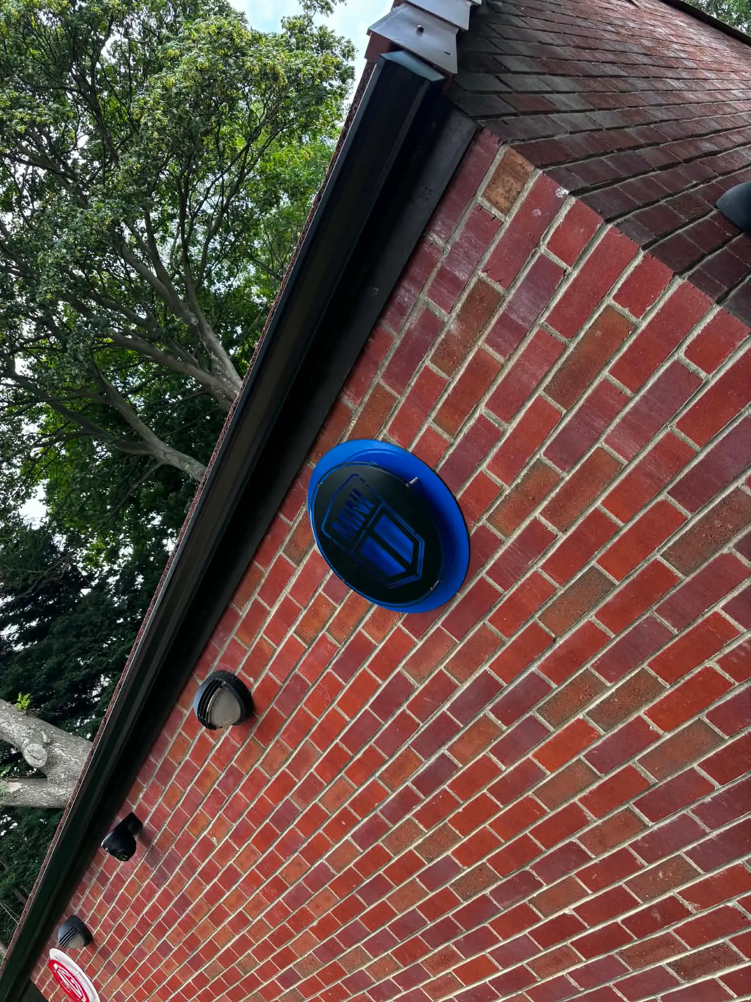 Seamless aluminium gutter connected to downpipe in Rotherham